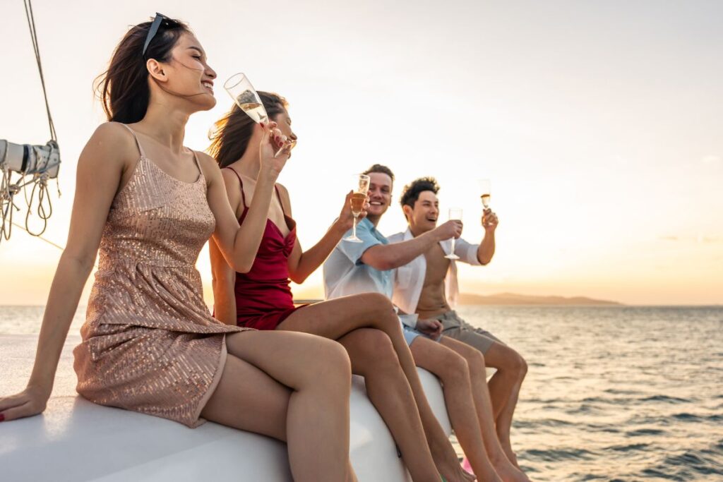 toast on luxury charter at sunset